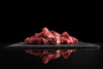 Meat slice isolated on black cooking set